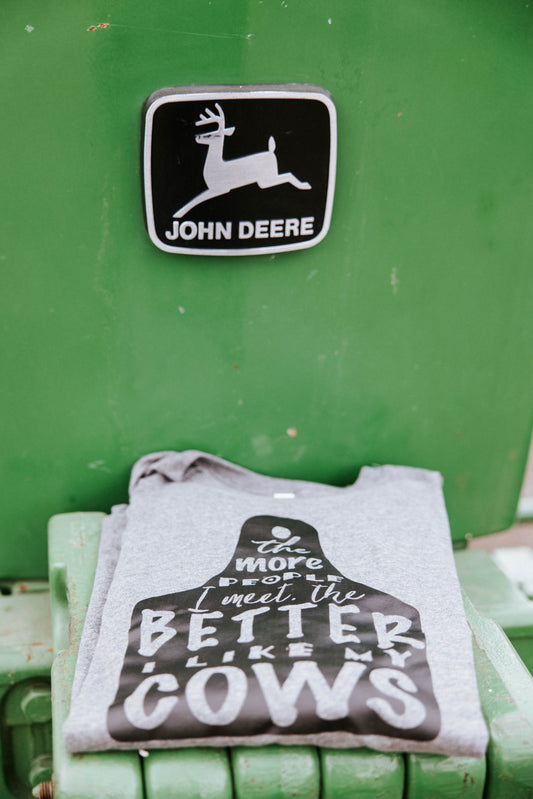Grey shirt folded on a green tractor