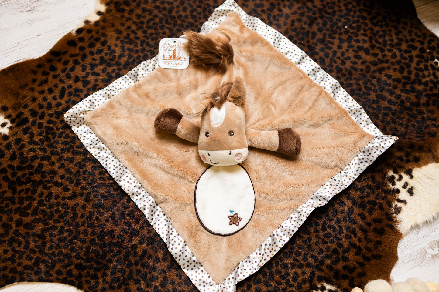 flat lay of snuggler blanket