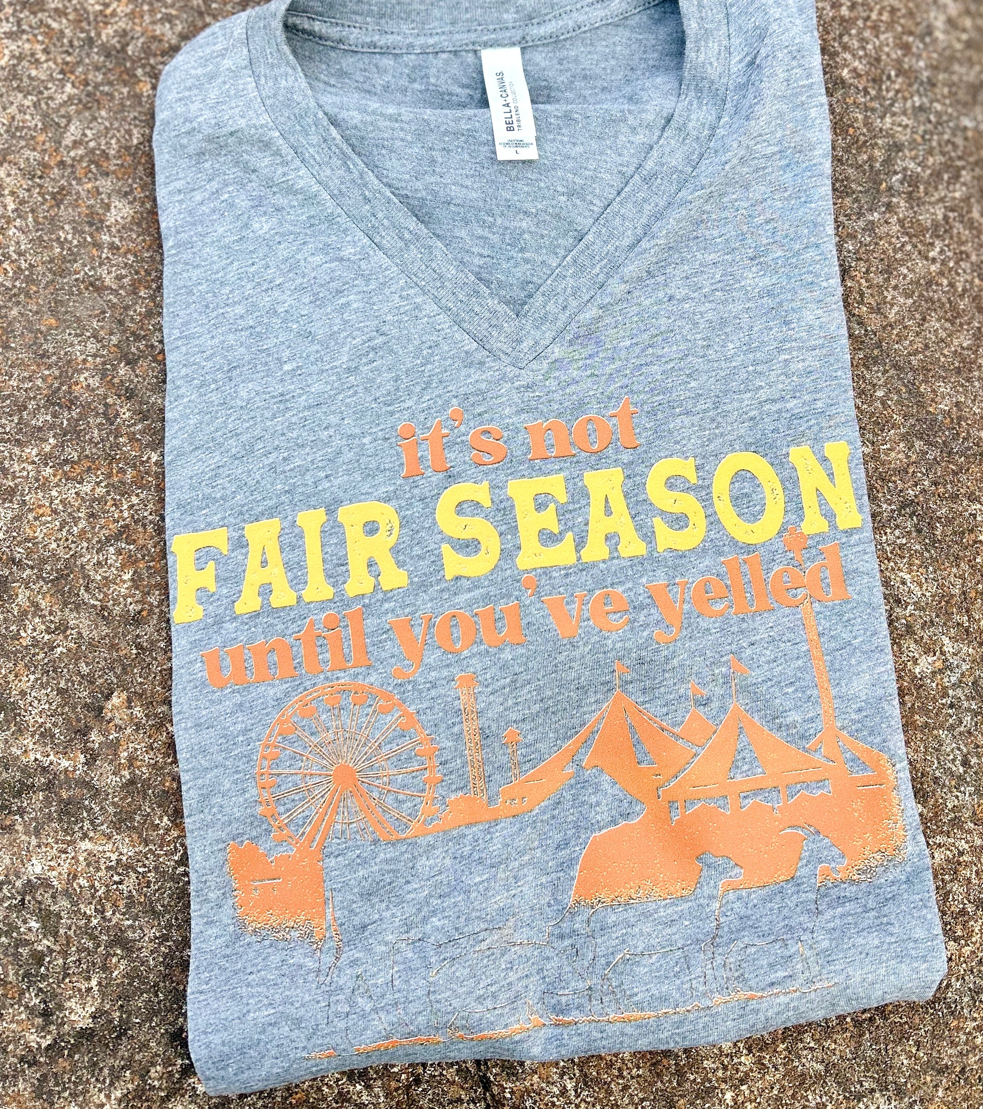 grey tshirt with graphic on a brown background