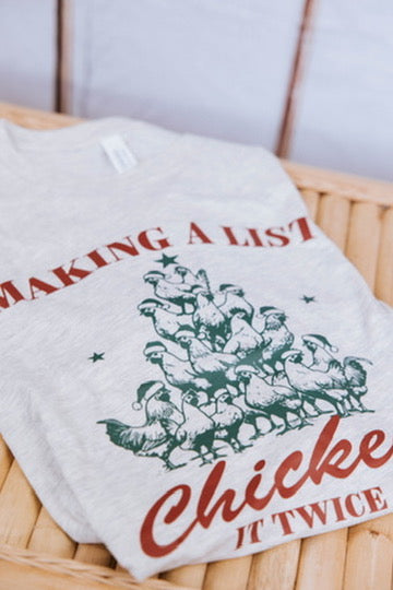 Towel with humorous chicken graphic and text on a woven basket