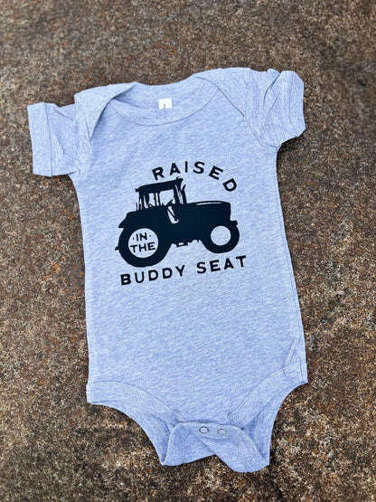 grey onesie on a concrete background
