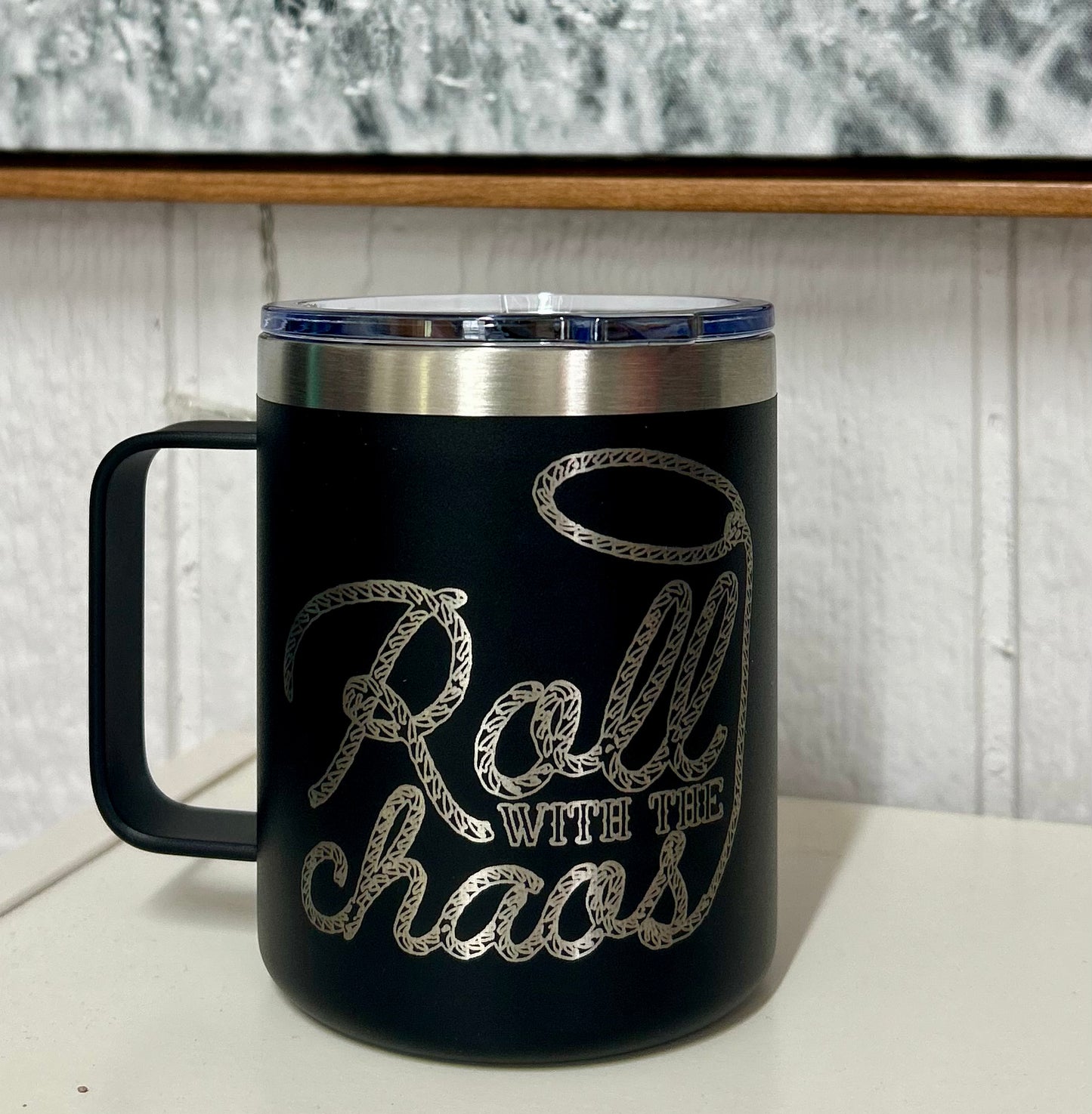 black mug with silver graphic engraved