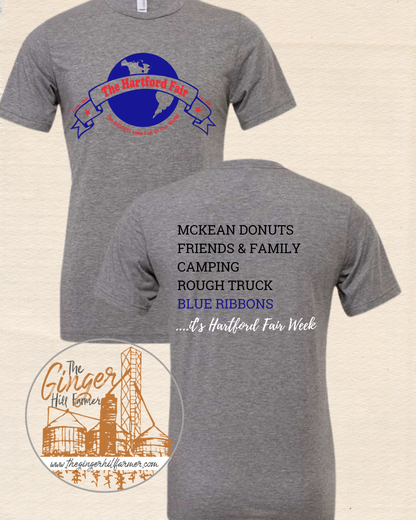 Gray t-shirt with Hartford Fair logo on front and text on back, on a beige background.