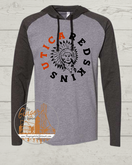 chief graphic on grey hooded tshirt on a wood background