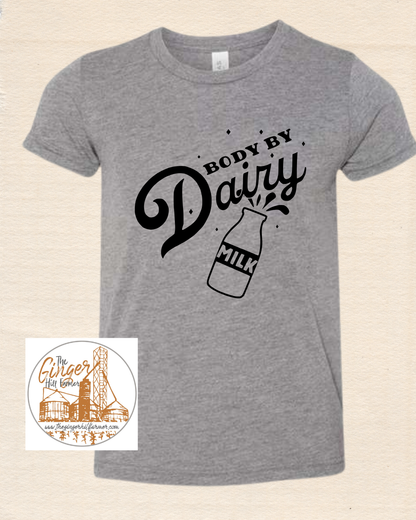 Gray t-shirt with 'Body by Dairy' text and milk bottle graphic on a beige background