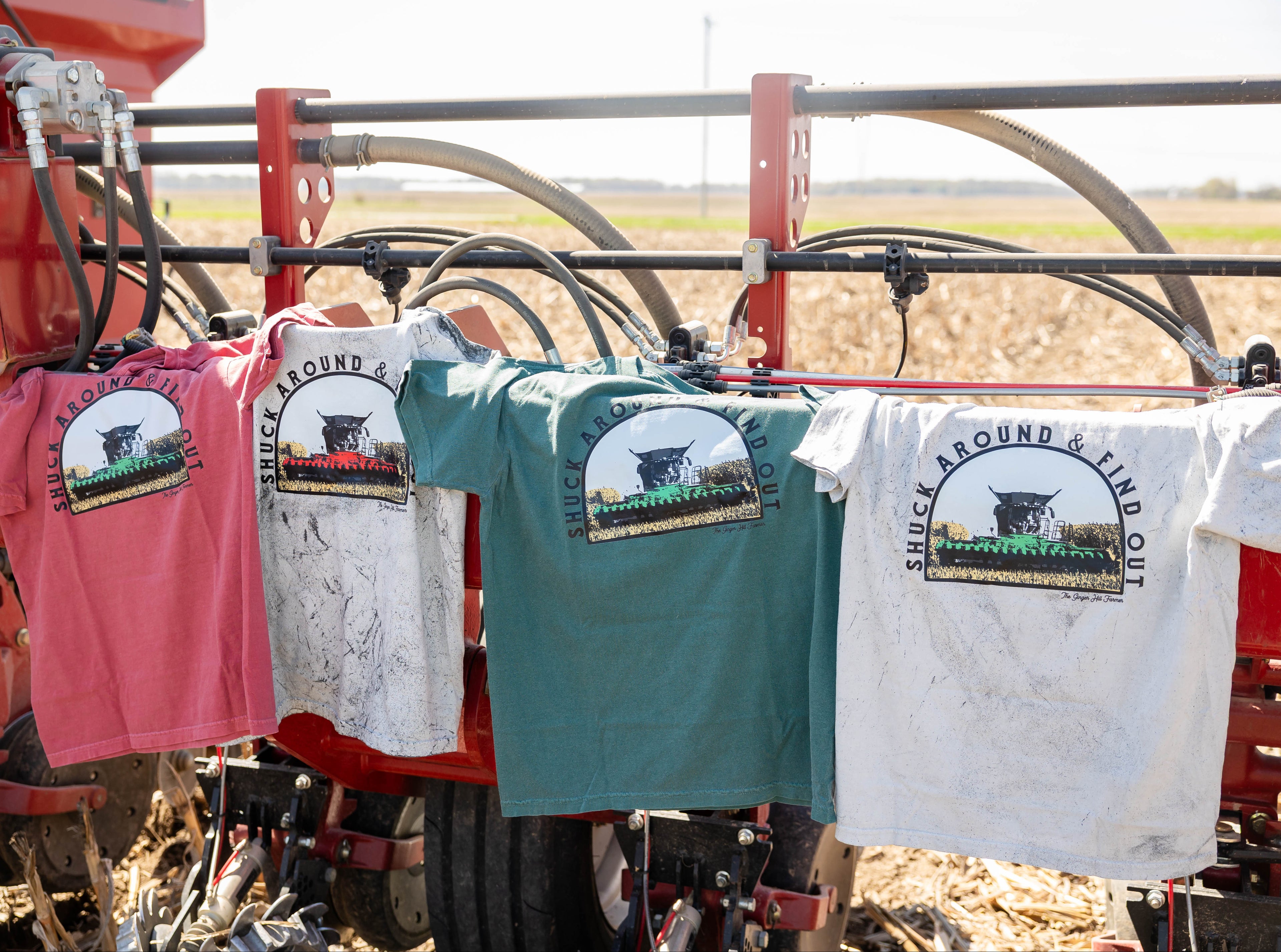 front view of all tees hanging on a planter