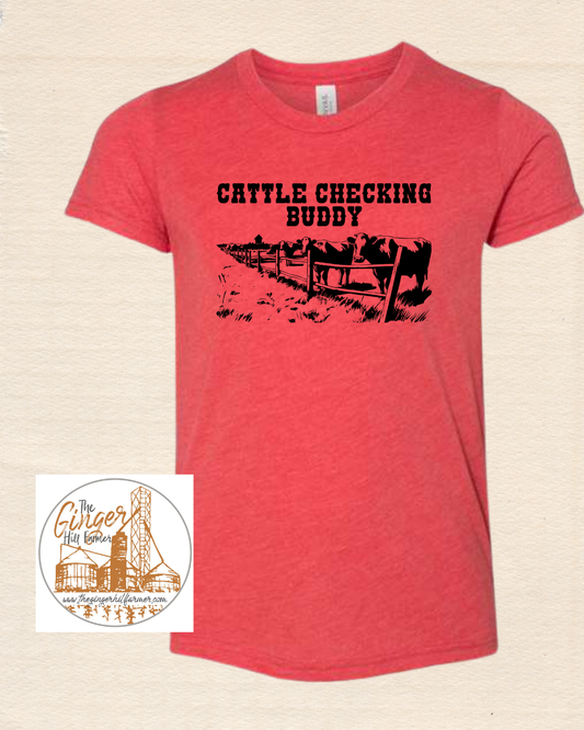 Red t-shirt with 'Cattle Checking Buddy' graphic on a beige background