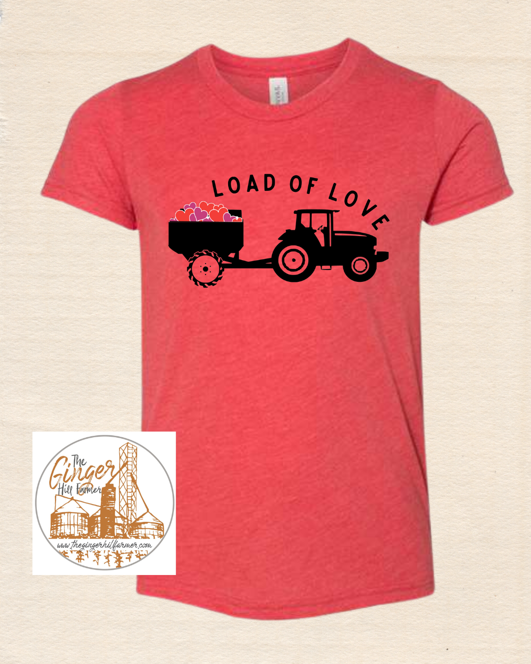 Red t-shirt with a black tractor graphic and 'Load of Love' text on a beige background.