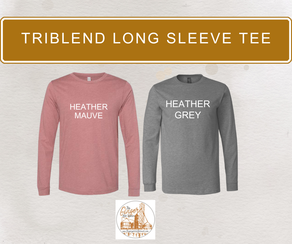 Two long-sleeve triblend shirts in heather mauve and heather grey with 'TRIBLEND LONG SLEEVE TEE' text on a light gray background.