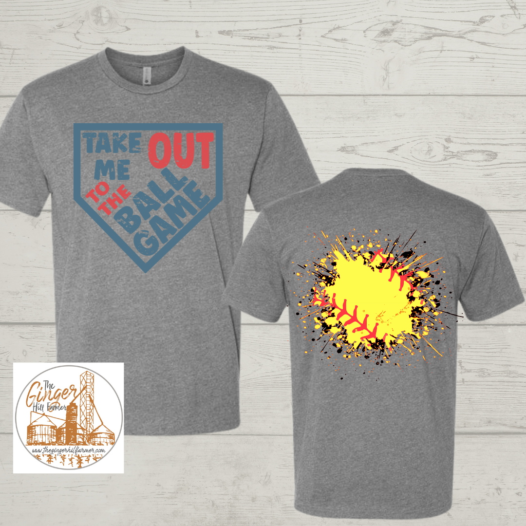 Gray t-shirt with 'Take Me Out to the Ball Game' front and colorful baseball design back on a wooden surface.