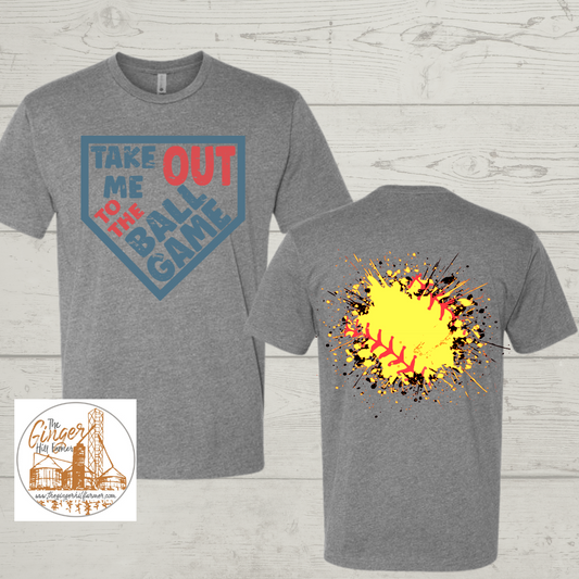 Gray t-shirt with 'Take Me Out to the Ball Game' front and colorful baseball design back on a wooden surface.