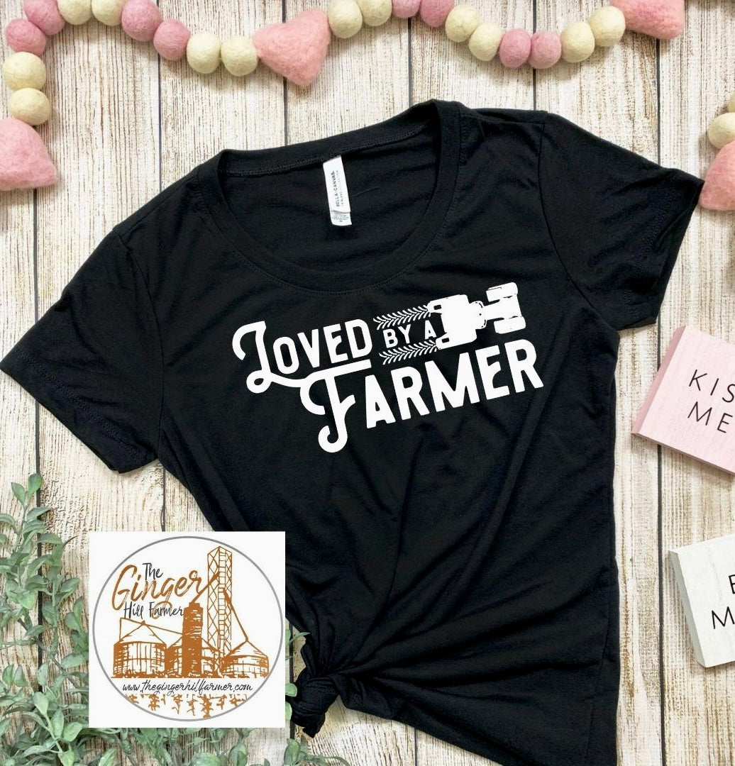 loved by a farmer black short sleeve t-shirt