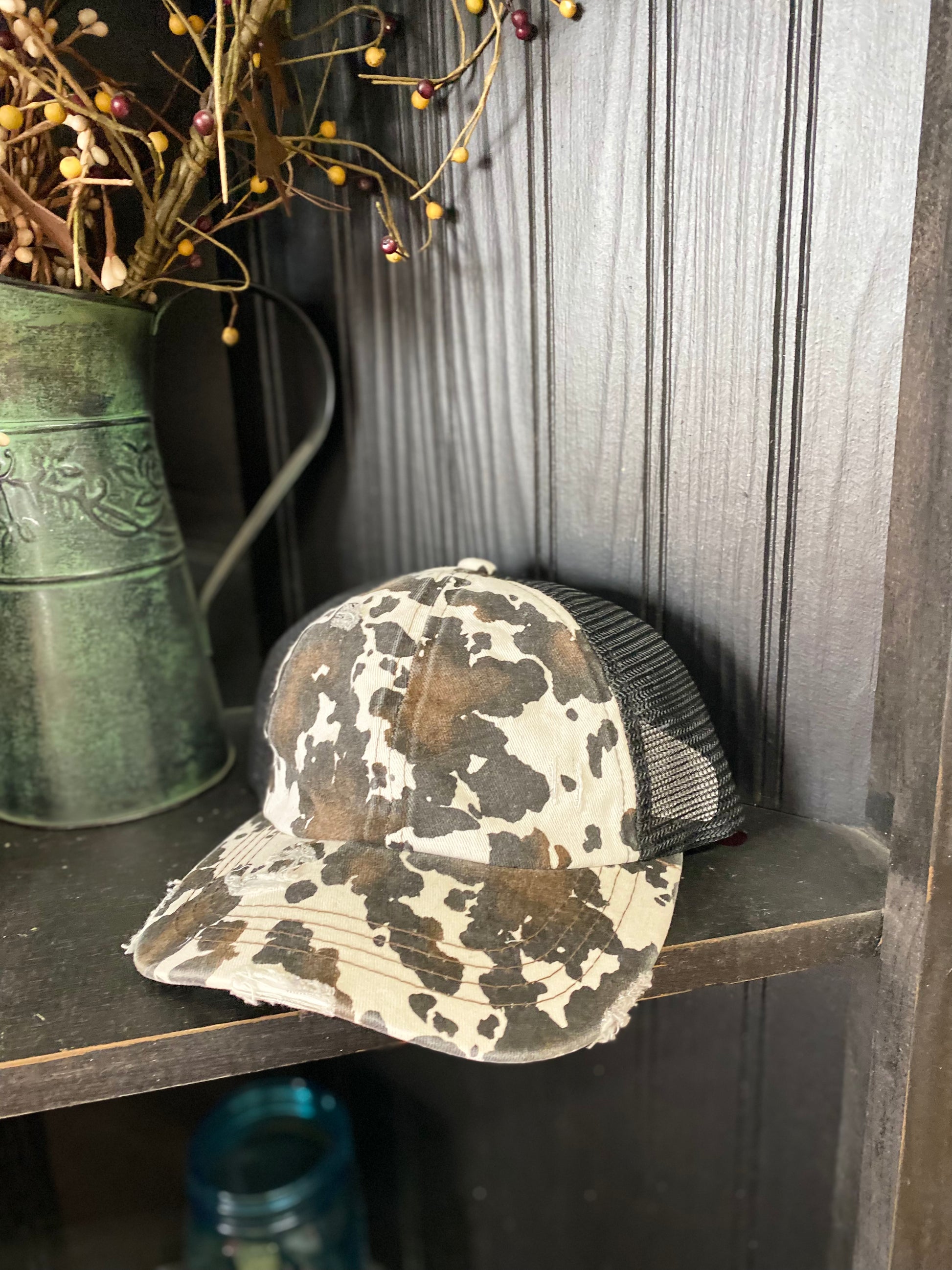 front view of cow print hat
