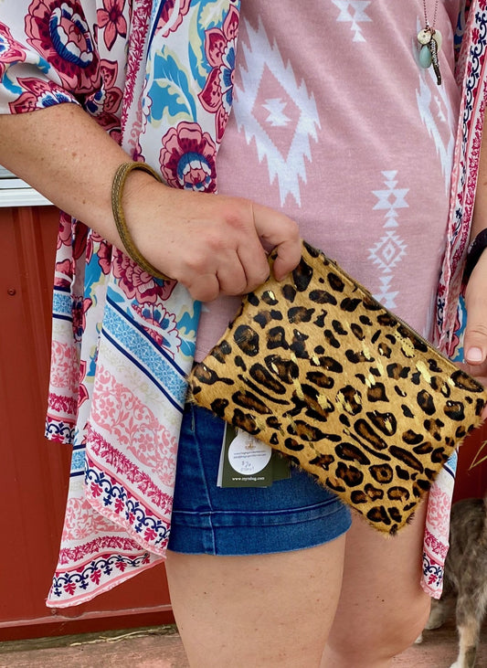 Animal Hair-On Pouch wristlet held by model