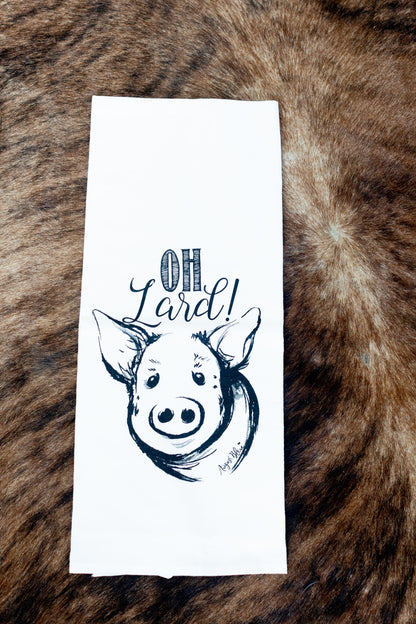 flat lay of "oh lard" funny pig tea towel