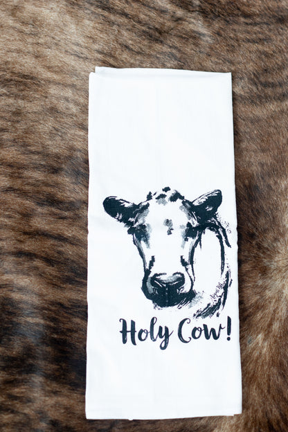 flat lay of "holy cow!" funny cow tea towel